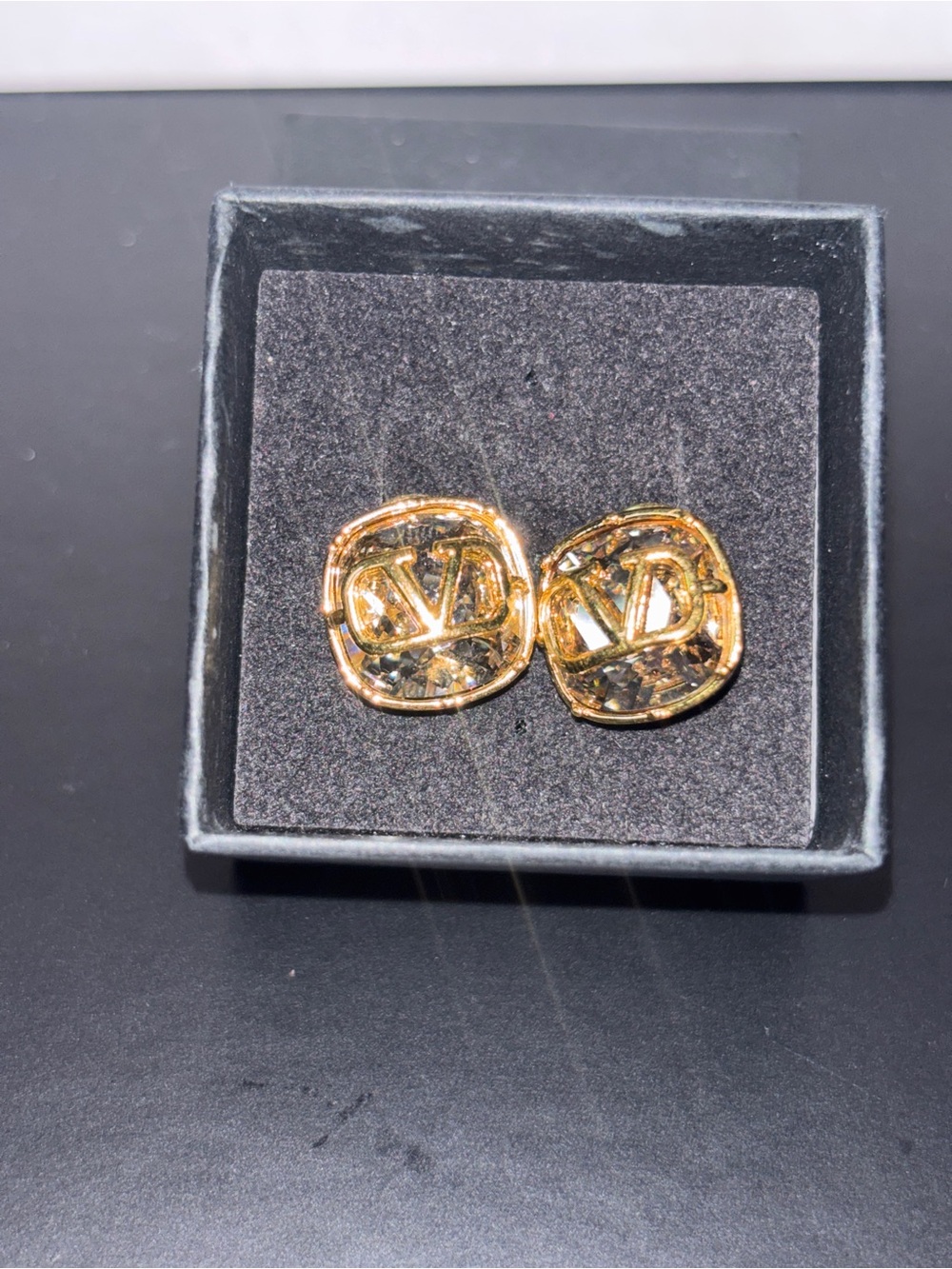 Valentino Garavani VLogo Signature Crystal Earrings in gold and crystal.